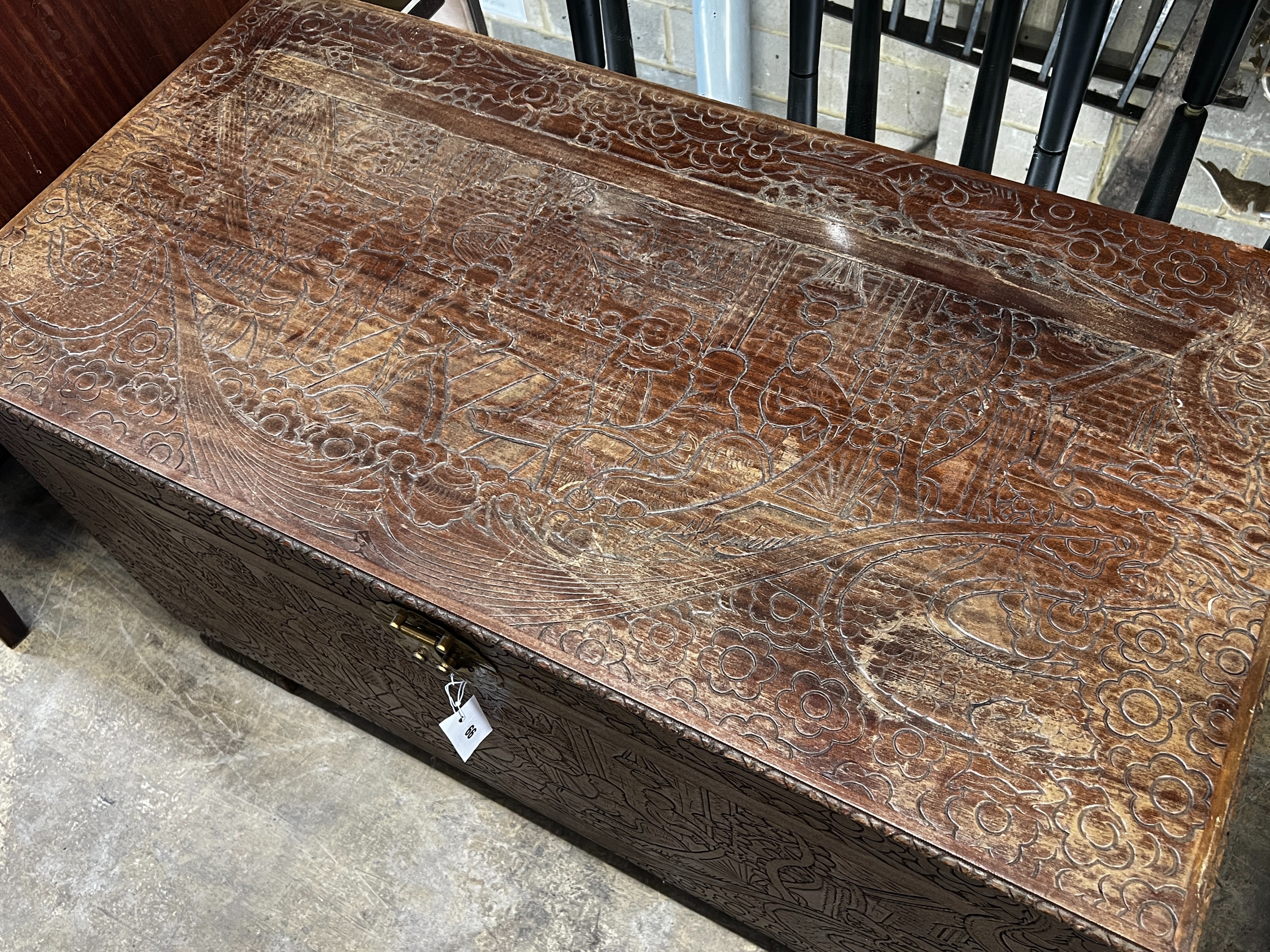 A Chinese carved hardwood trunk, length 102cm, depth 52cm, height 61cm
